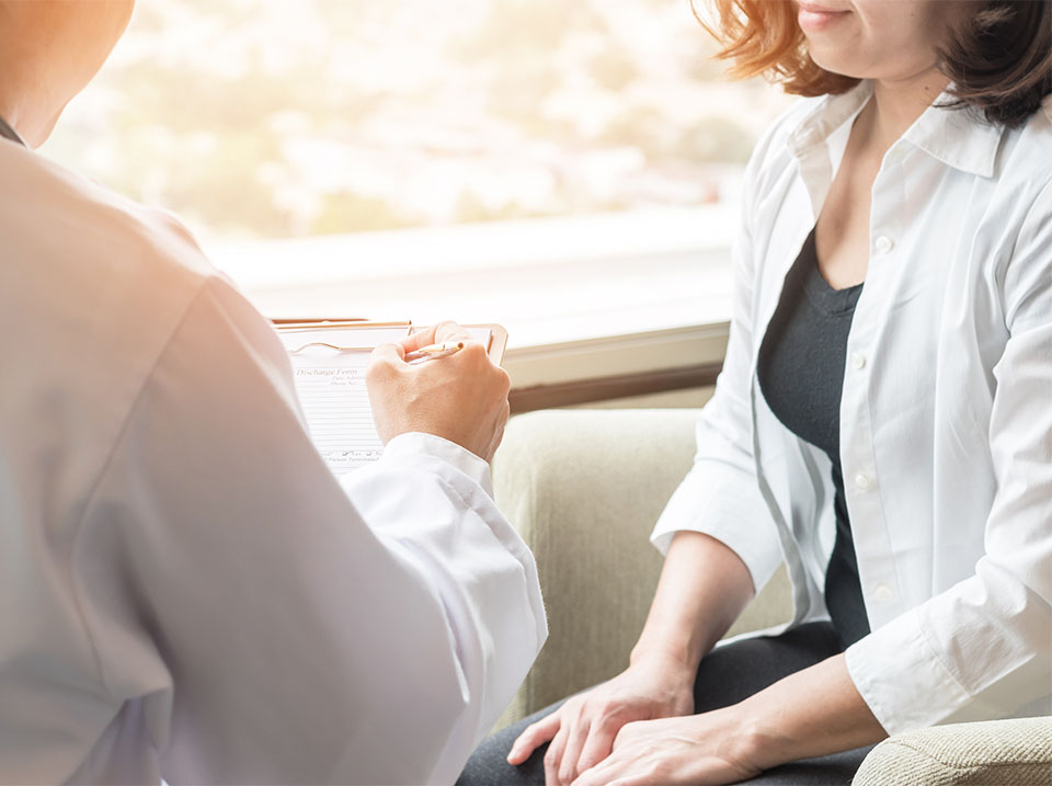 doctor with female patient