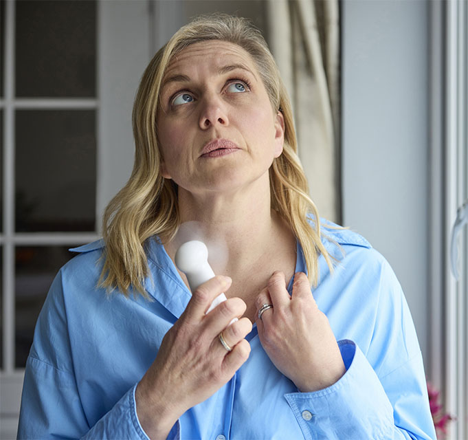 woman in menopause having a hormonal hot flash